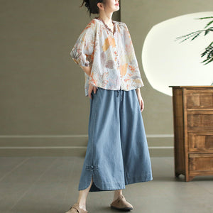 Áo sơ mi linen ngắn tay cổ V xếp ly in hoa lá retro - A043