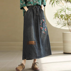 Chân váy denim lưng thun thêu vòng nguyệt quế - NU10084