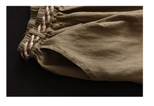 Chân váy linen lưng thun hai túi chéo đính khuy kiểu - NU9871
