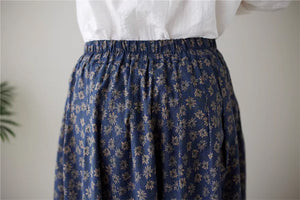Chân váy linen retro lưng thun túi chéo in hoa cúc liti - NU9156