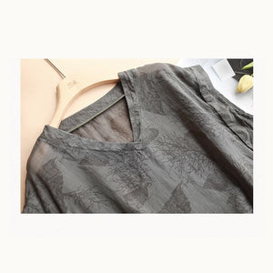 Bộ đồ linen gồm áo sơ mi sát nách cổ V và quần sooc in hoa văn retro hai lớp - NU8972