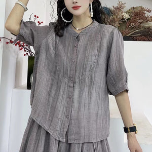 Bộ đồ linen gồm chân váy xẻ vạt và áo sơ mi ngắn tay cổ tròn - NU10405