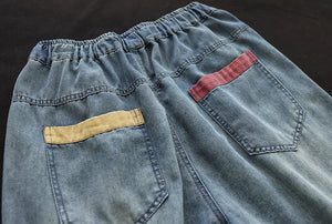 Quần baggy lửng denim lưng thun thêu những vạch màu - NU8902