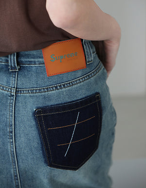 Chân váy denim lưng cao khuy cài xẻ tà sau - NU9932