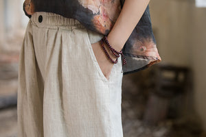 Quần baggy linen lưng thun ống rộng đính khuy - NU9818