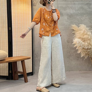 Áo sơ mi linen ngắn cổ tròn xếp ly thêu hoa lá - NU9773