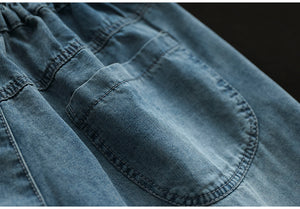Quần baggy lửng denim lưng thun thêu hoa lá và ô vuông - NU8746
