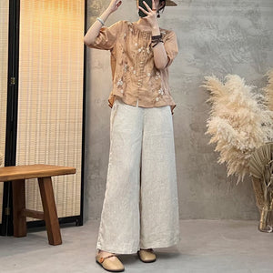 Áo sơ mi linen ngắn cổ tròn xếp ly thêu hoa lá - NU9773