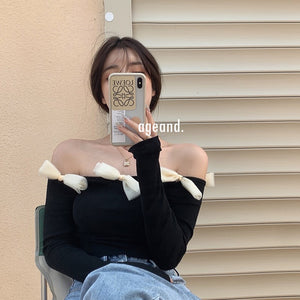 Áo T-shirt dài tay trễ vai kiểu đính nơ - NU8334