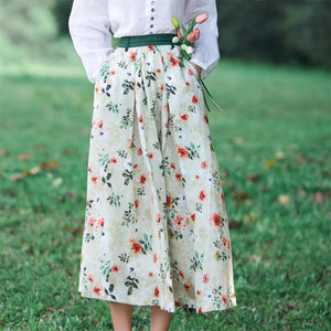 Chân váy linen retro lưng cao in hoa lá hai túi chéo - NU9047