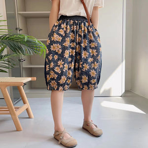 Quần baggy lửng denim lưng thun in hoa lá gấu túm - NU8876