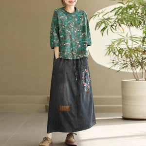 Chân váy denim lưng thun thêu vòng nguyệt quế - NU10084