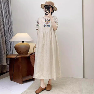 Đầm liền linen ngắn tay cổ tròn thêu hoa đối xứng kiểu chiết eo - NU10503