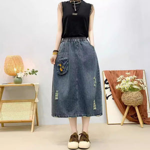 Chân váy denim lưng thun một túi hộp thêu hoa - NU10441