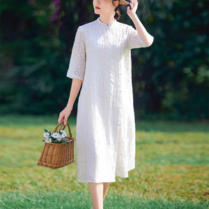 Đầm liền linen retro ngắn tay cổ đứng thêu hoa văn vạt lệch - NU9049