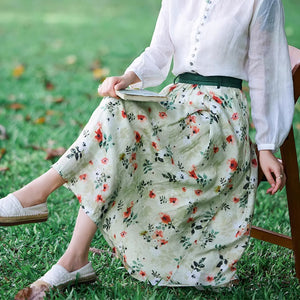 Chân váy linen retro lưng cao in hoa lá hai túi chéo - NU9047