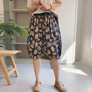 Quần baggy lửng denim lưng thun in hoa lá gấu túm - NU8876