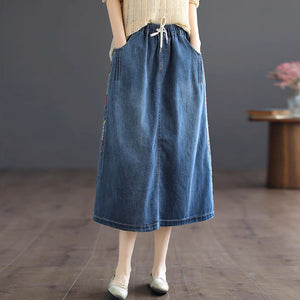 Chân váy denim lưng thun dây rút thêu hoa lá - NU8874