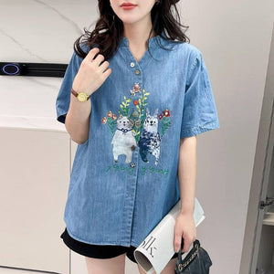 Áo sơ mi denim ngắn tay cổ đứng in hoạt hình - NU8899