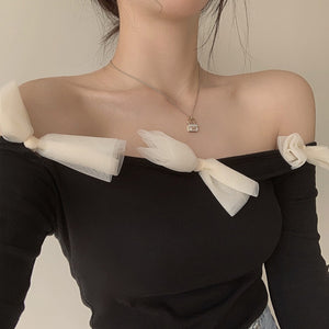 Áo T-shirt dài tay trễ vai kiểu đính nơ - NU8334
