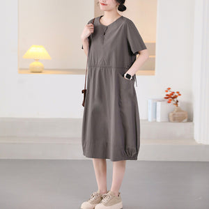 Đầm liền ngắn tay cổ tròn dây rút hai túi tròn - D059