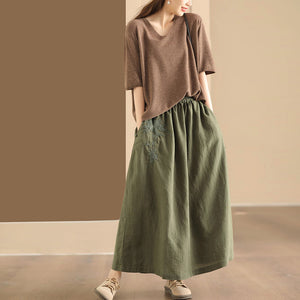 Chân váy linen lưng thun túi chéo thêu hoa văn khuy tròn - NU10250
