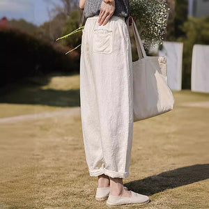 Quần baggy linen lưng thun hai túi chéo tua rua - NU10211