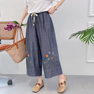 Quần baggy lưng thun ống rộng thêu hoa lá trừu tượng - NU8720