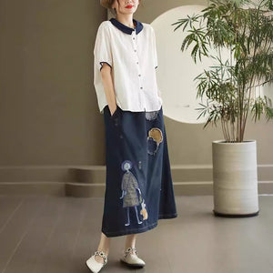 Chân váy denim lưng thun thêu cô gái và chú thỏ - NU10359