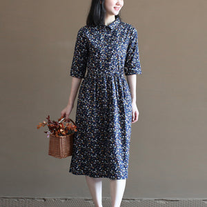 Đầm liền linen ngắn tay cổ đức in những chiếc lá sắc màu - NU10016