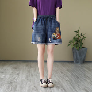 Quần sooc denim lưng thun thêu cô gái bên giỏ hoa - NU9881