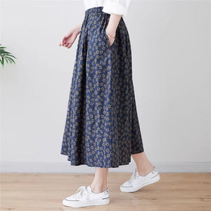 Chân váy linen retro lưng thun túi chéo in hoa cúc liti - NU9156