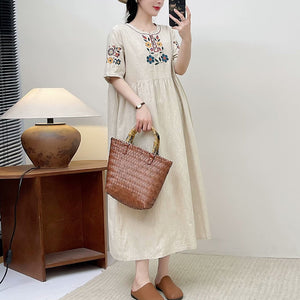 Đầm liền linen ngắn tay cổ tròn thêu hoa đối xứng kiểu chiết eo - NU10503