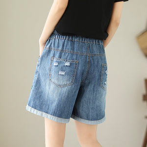 Quần sooc denim lưng thun thêu hoa lá chỉ nổi - NU10287