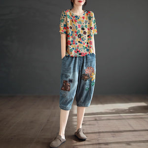 Quần baggy lửng denim lưng thun thêu hoa lá và ô vuông - NU8746
