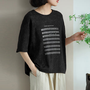 Áo T-shirt ngắn tay cổ tròn in bản nhạc - NU10223