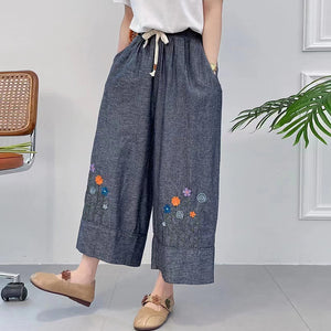 Quần baggy lưng thun ống rộng thêu hoa lá trừu tượng - NU8720