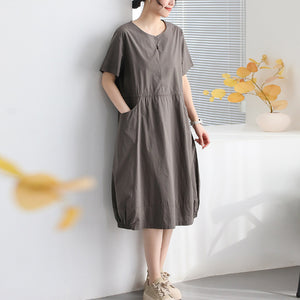 Đầm liền ngắn tay cổ tròn dây rút hai túi tròn - D059