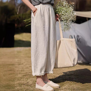 Quần baggy linen lưng thun hai túi chéo tua rua - NU10211