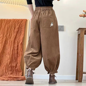 Quần baggy nhung lưng thun ống côn bo chun thêu hoa lá - NU9245