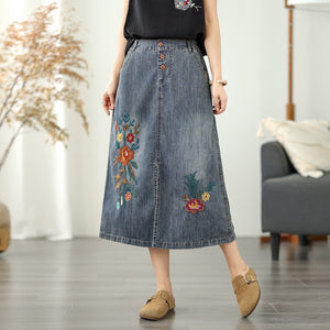 Chân váy denim lưng thun thêu hoa lá vạt xẻ trước - V106