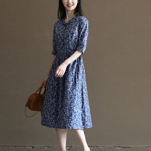 Đầm liền linen ngắn tay cổ pipi in hoa lá chiết eo - NU10022