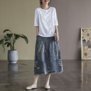 Chân váy denim lưng thun ba khuy cài thêu hoa lá - V007