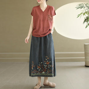 Chân váy denim lưng thun dây rút thêu hoa lá - NU10450