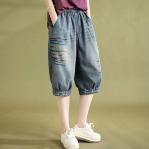 Quần baggy lửng denim lưng thun thêu những vạch màu - NU8902