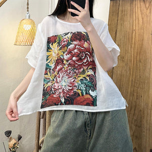 Áo T-shirt linen ngắn tay cổ tròn in hoa lá vạt xẻ - NU10443