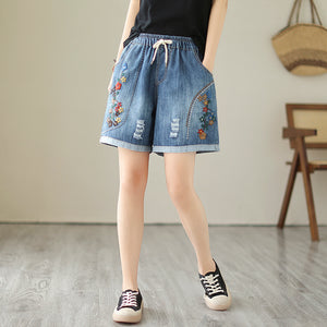 Quần sooc denim lưng thun thêu hoa lá chỉ nổi - NU10287