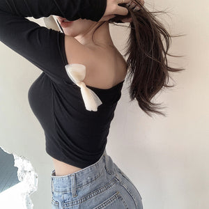 Áo T-shirt dài tay trễ vai kiểu đính nơ - NU8334