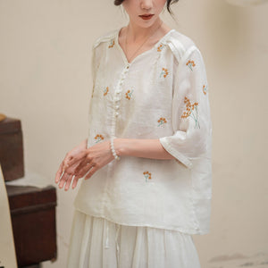 Áo sơ mi linen ngắn tay cổ V thêu hoa lá vai xếp ly - NU10140