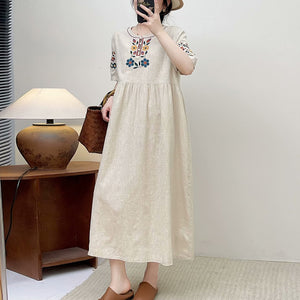 Đầm liền linen ngắn tay cổ tròn thêu hoa đối xứng kiểu chiết eo - NU10503